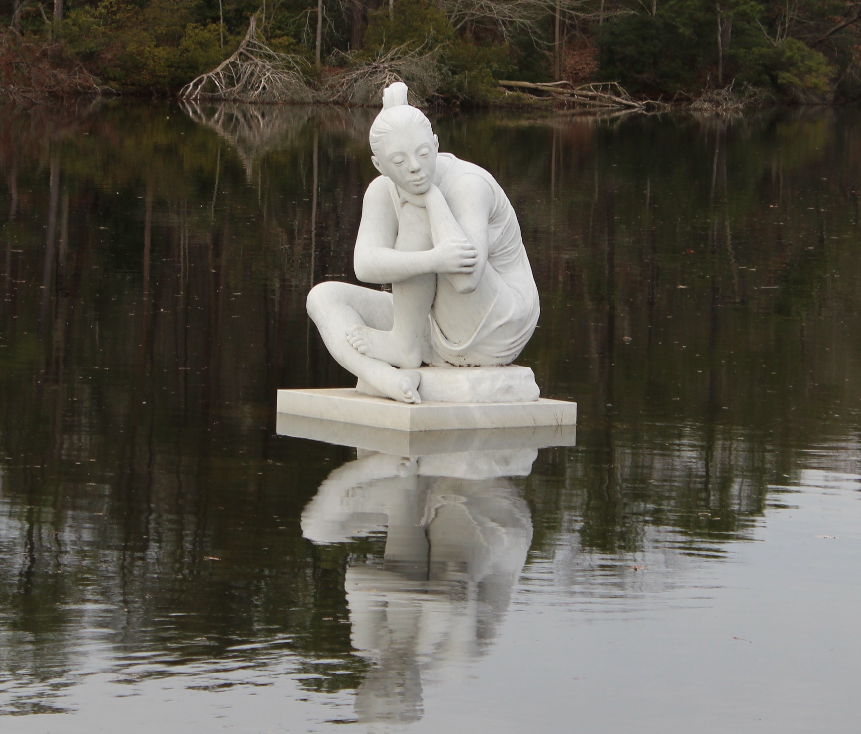 Altered pond statue